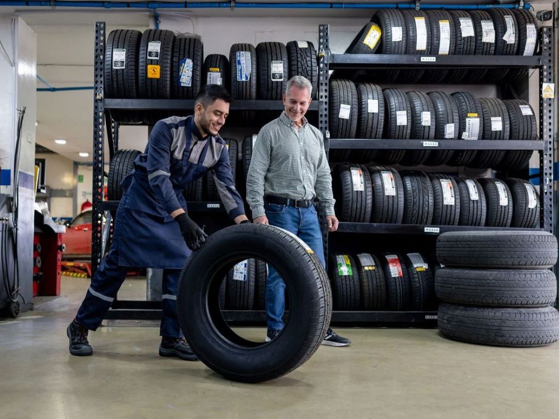 Customer choosing tires at Blackhorse Automotive